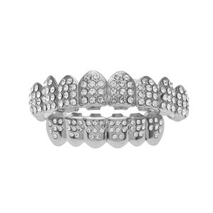 Macro shot of silver hip hop grillz set featuring sparkling cubic zirconia stones