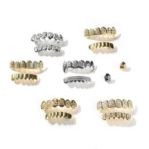 Hip hop style gold and silver iced out teeth grills with cross design and CZ stones
