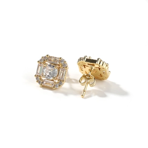 Detailed view of octagon gold stud earrings with baguette and round cubic zirconia
