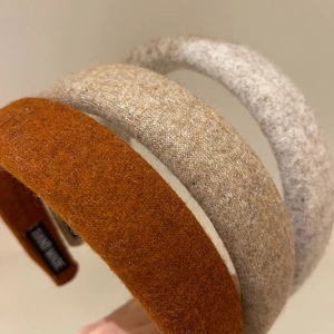 Three-piece set of thick wool padded headbands in orange, coffee, and grey colors