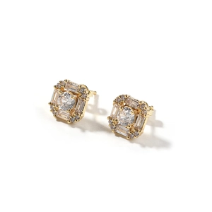 Detail view of square hip-hop studs with golden metal and clear sparkling crystals