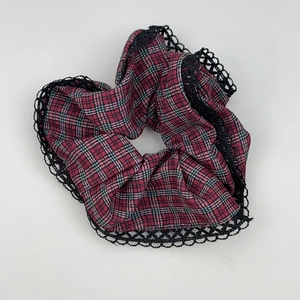 Red plaid scrunchie with black lace trim detail showing cotton fabric and retro pattern