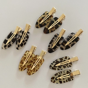 Set of 10 leopard and tiger print acrylic hair clips with gold metal duckbill clamps