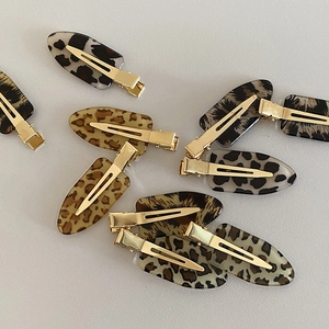 Chic leopard and cow print acetate hair clips with gold metal base for women