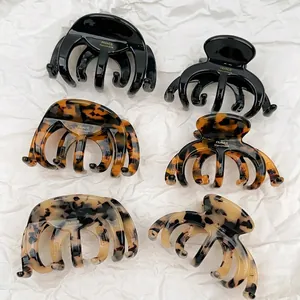 Classic octopus hair claws set in black, tortoise shell, and cream leopard patterns