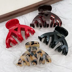 Thickened acetate shark hair claws in red, brown, black and tortoiseshell finishes