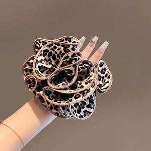 French leopard print oversized scrunchie with layered ruffles for stylish hair styling
