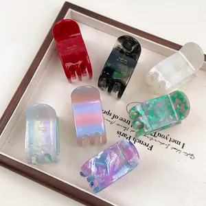 Set mit sechs französischen Acetat-Haarklammern in verschiedenen Farben mit Goldschrift