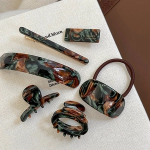 Elegant acetate geometric hair clip set with dark green marble tortoiseshell pattern