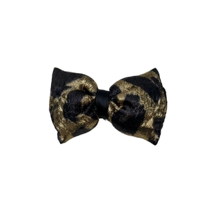 French leopard pattern bow hair clip with black and gold metallic jacquard texture