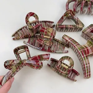 Elegant Christmas red and green plaid hair claws in various geometric resin shapes