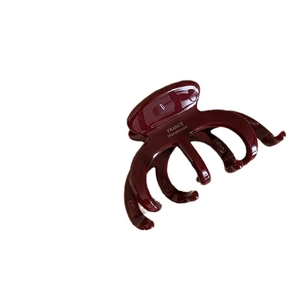 French vintage pumpkin-shaped burgundy acetate hair claw clip with handmade engraving
