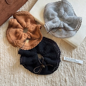 Three-piece set of knitted bow hair scrunchies in brown, gray and black colors