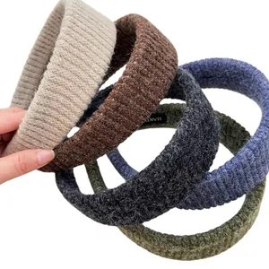 Knitted striped headband set in autumn winter colors with handmade woven texture