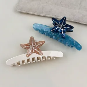 Starfish pattern acetate hair claws in blue marble and cream white for women