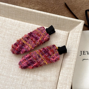Elegant tweed teardrop hair clips in pink and purple mix with matte black metal base