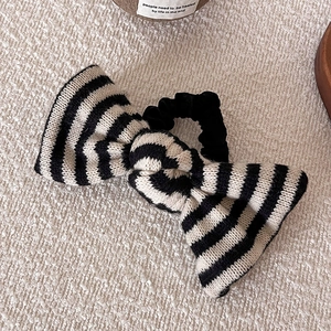 Knitted black and white striped bow scrunchie with elastic hair tie for women