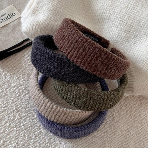 Chic knitted wide headbands in earthy tones with handmade label for winter hair styling