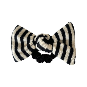 Knitted black and white striped bow scrunchie with soft texture for hair styling