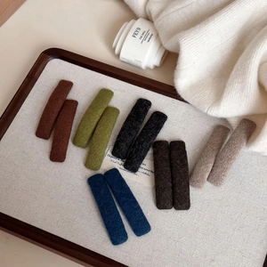 Set di fermagli per capelli BB in lana lavorata a maglia colorata in toni vintage
