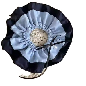 Sweet sea salt blue denim scrunchie with a black ribbon bow and pearl pendant drop