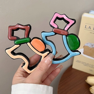 Pince à cheveux abstraite en résine colorée aux motifs géométriques pour queue de cheval