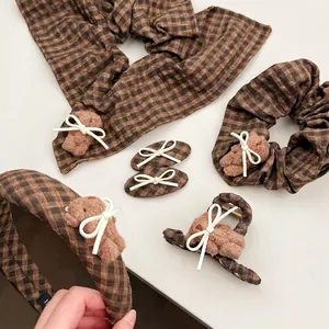 Plaid hair accessory set with teddy bear and bows including headband and scrunchies