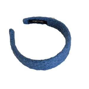 Handmade navy blue knit diamond patterned wide headband with comfortable padded design