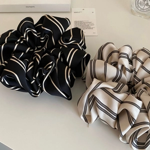Elegant set of two large striped satin scrunchies in classic black and beige silk texture