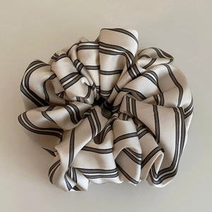 Vintage cream oversized satin hair scrunchie with classic black stripes for high-end styling