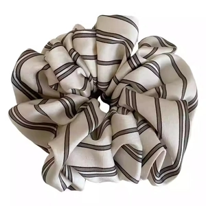 Elegant vintage striped satin scrunchie in cream and black for stylish ponytails