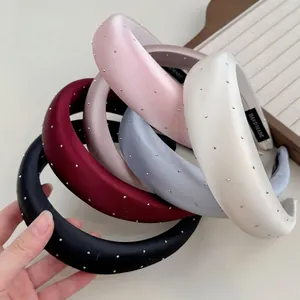 Elegant satin padded headbands with silver beads and handmade labels in five soft colors