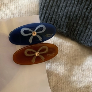 Set of 2 French acetate oval hair clips with sparkling rhinestone bow pattern