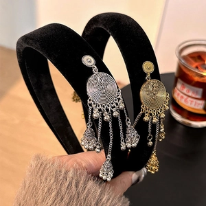 Ethnic style velvet headband with gold and silver bell tassels and vintage metal charms