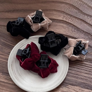 Elegant velvet bow hair clips set in black, champagne, and burgundy for autumn and winter