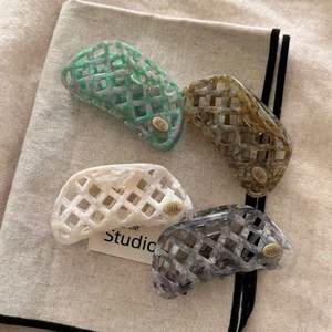 Hollow out waffle texture acetate hair claws in marble green brown white and grey colors