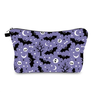 Detail of Halloween cosmetic bag with purple print of bats, skulls and stars