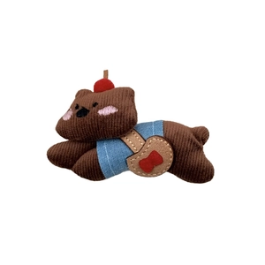 Cute brown plush teddy bear hair claw clip featuring corduroy fabric and red cherry decor