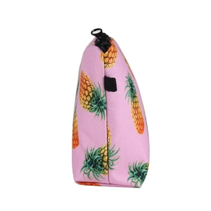 Pink makeup bag with pineapple print, durable fabric and black zipper closure