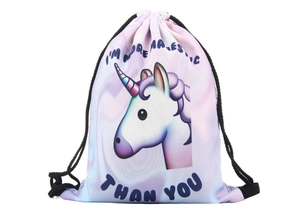 Detailed view of unicorn drawstring bag with purple tie-dye print and majestic slogan