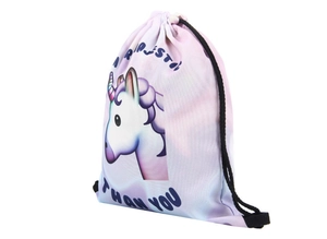 Detail of unicorn drawstring backpack with majestic lettering on gradient fabric