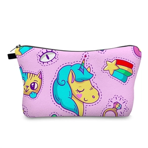 Detailed view of pink cosmetic bag with unicorn prints and durable black zipper closure