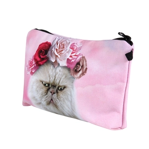 Close-up of pink 3D cat print makeup bag with zipper and floral wreath detail