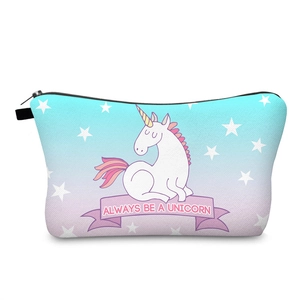 Detail of unicorn makeup bag with blue purple gradient print and Always Be A Unicorn text