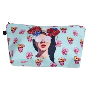 Detail of light blue zipper pouch featuring a girl with a flower wreath and pink roses