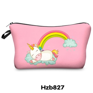 Detailed view of pink cosmetic bag with digital unicorn print and secure black zipper
