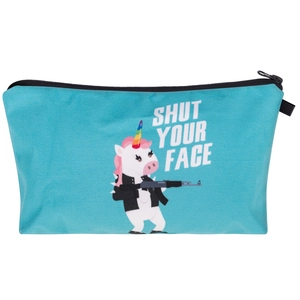 Detail of blue canvas makeup bag with punk unicorn print and black zipper closure