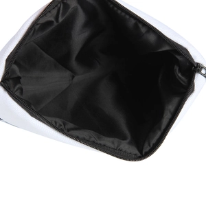 Internal view of unicorn printed makeup bag with black lining and metal zipper closure