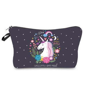 Close-up of unicorn print on purple polyester makeup bag with durable side handle