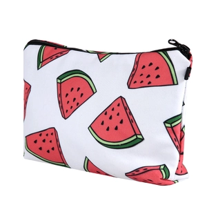 Detail of summer watermelon print makeup bag with smooth black metal zipper closure